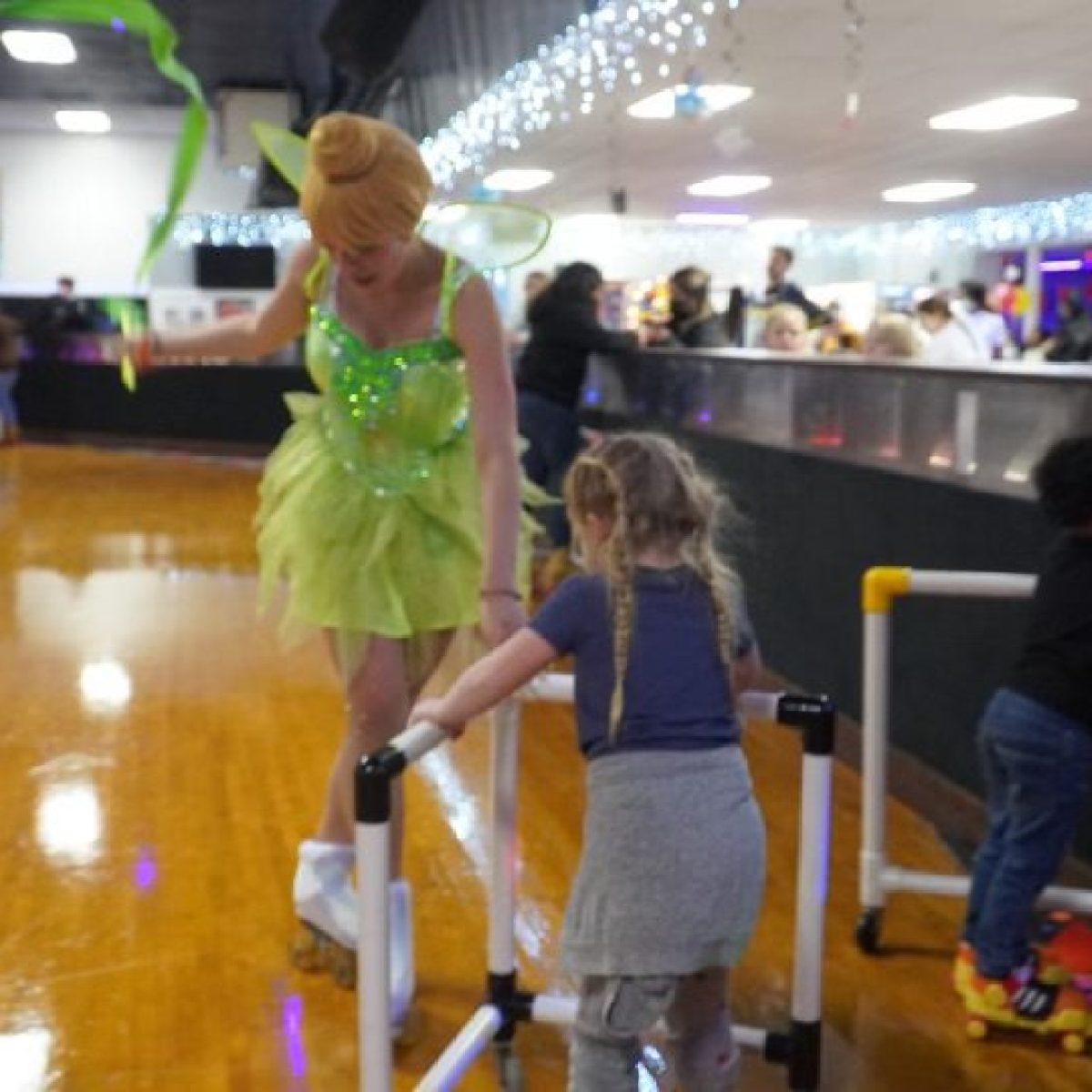 a little girl standing in a room