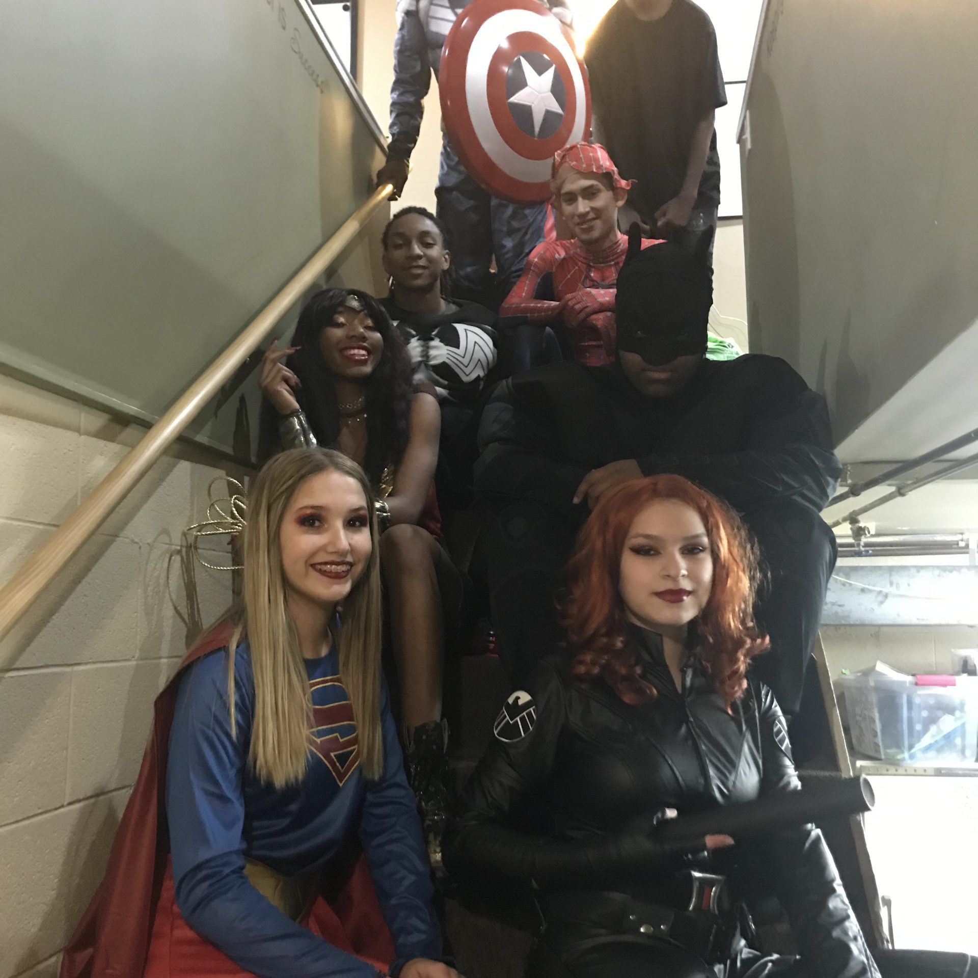 a group of people posing for the camera